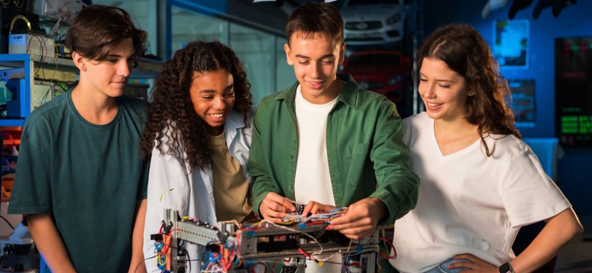 group-of-young-people-doing-experiments-in-robotics